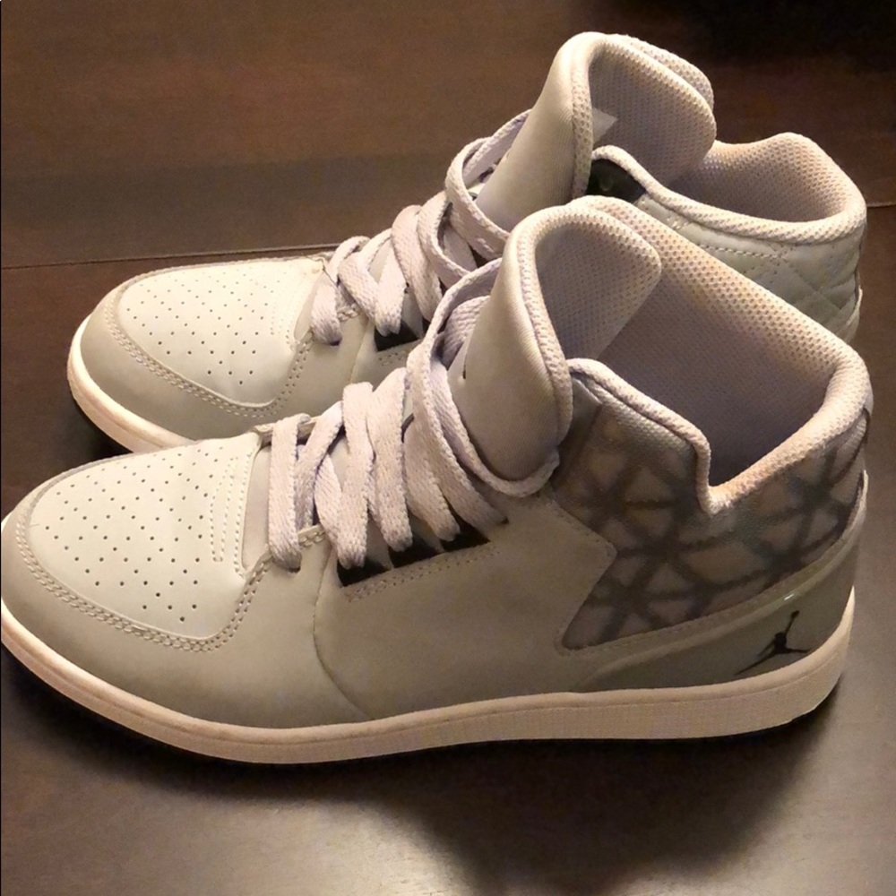 Women’s gray Air Jordan basketball sneakers